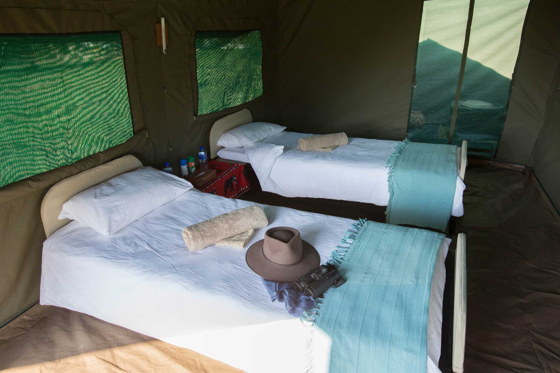 Inside our tents, 2 beds plus extra room for shower